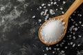 white crystal sugar in a wooden spoon Royalty Free Stock Photo