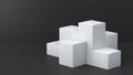 White cube boxes with dark blank wall background for display. 3D rendering.