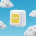 A white, cube-shaped object floats against a clear blue sky, surrounded by fluffy cloud Royalty Free Stock Photo