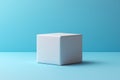 Minimalist white cube on a soft blue background showcasing simple elegance in design Royalty Free Stock Photo