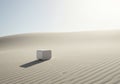 White Cube in a Sunlit Desert Landscape Royalty Free Stock Photo