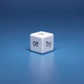 White cube with words Off and Try rests on blue surface. Symbolizes decision making, risk, choice, and testing new options in Royalty Free Stock Photo