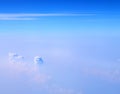 White Cumulonimbus and Altostratus Clouds in Infinite Blue Sky - Aerial View - Abstract Natural Background Royalty Free Stock Photo