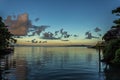 White Cumulostratus or Cumulus clouds over a lagoon on Samoa Royalty Free Stock Photo