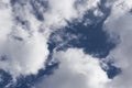 White cumulus clouds against a dark blue sky natural background weather change wind Royalty Free Stock Photo