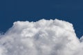 White cumulus clouds against a dark blue sky natural background weather change wind Royalty Free Stock Photo