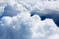 White cumulus clouds on blue sky background close up, overcast skies backdrop, fluffy cloud texture, beautiful sunny cloudscape Royalty Free Stock Photo