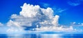 White cumulus clouds in blue sky over sea landscape, big cloud above ocean water panorama, horizon, beautiful tropical seascape Royalty Free Stock Photo