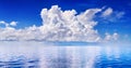 White cumulus clouds in blue sky over sea landscape, big cloud above ocean water panorama, seascape panoramic view, cloudy weather Royalty Free Stock Photo