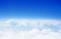 White cumulus clouds clear blue sky background, aerial beauty cloudscape panoramic view from above, high azure skies panorama Royalty Free Stock Photo