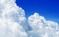 White cumulus clouds on clear blue sky background close up, beautiful aerial cloudscape view, azure skies backdrop, fluffy cloud Royalty Free Stock Photo