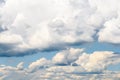 White Cumulus Clouds And Grey Storm Clouds On Blue Sky Royalty Free Stock Photo