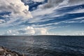 White cumulus clouds in sky over blue sea water landscape, big cloud above ocean panorama, horizon, beautiful tropical sunny Royalty Free Stock Photo