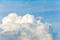 White cumulus congestus clouds on blue sky background. Royalty Free Stock Photo