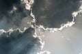 White cumulus congestus clouds on dramatic dark blue sky background