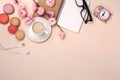 White cup with cappuccino, sakura flowers, macarons, alarm clock Royalty Free Stock Photo