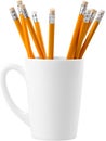 White ceramic cup with pencils isolated on white Royalty Free Stock Photo