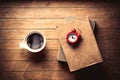 White cup with coffee and books Royalty Free Stock Photo