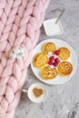 White Cup of Coffee Cappuccino with Heart Pattern of Cinnamon, Cottage Cheese Pancakes with Raspberries Royalty Free Stock Photo