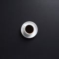 A white cup of coffee on a dark grey desk background Royalty Free Stock Photo