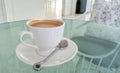 White Cup of Coffee on Glass Table used as Template Royalty Free Stock Photo