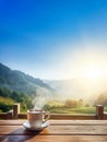 white cup of coffee and smoke on a wooden table with view of mountain and blue sky. copy space for text, vertical picture