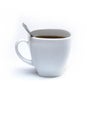 White cup of coffee with spoon on an isolated background. Black cappuccino drink in a bowl Royalty Free Stock Photo