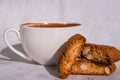 White cup of coffee and traditional homemade italian cantuccini cookies. Biscotti Cantuccini Cookie Biscuits with Royalty Free Stock Photo