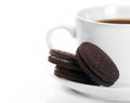 White cup of dark coffee and chocolate cookies