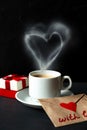 White cup of espresso coffee with heart shaped smoke Royalty Free Stock Photo