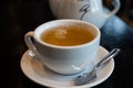 White cup of fresh browed green tea, Arles, France