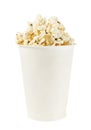 White cup full of popcorn Royalty Free Stock Photo