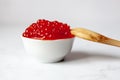 A white cup full of red caviar Royalty Free Stock Photo