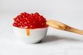 white cup full of red caviar Royalty Free Stock Photo