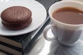 White cup of hot chocolate and a biscuit Royalty Free Stock Photo