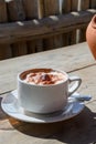 White cup of italian coffee cappuccino served in cafe Royalty Free Stock Photo