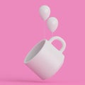 White cup on a pink minimalist background. ÃÂ¡offee and tea cup with clouds and balloons.