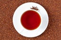 White cup of red rooibos South African tea with Royalty Free Stock Photo