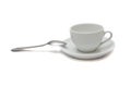 White cup with spoon and saucer Royalty Free Stock Photo