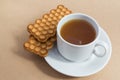 White cup of tea with biscuits Royalty Free Stock Photo