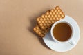 White cup of tea with biscuits Royalty Free Stock Photo