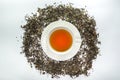 White cup of tea with dried tea leaf from top view Royalty Free Stock Photo