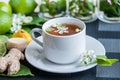 White cup with tea. Green, black, herbal, jasmine tea with lemon Royalty Free Stock Photo