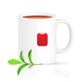 White cup of tea with red teabag and green branch Royalty Free Stock Photo
