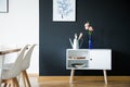 White cupboard in dining room