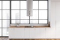 White cupboards in modern white kitchen