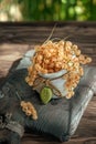 white currants in ceramic dishes on a wooden rustic table. Harvest of white currants, still life with wonderful sunlight Royalty Free Stock Photo