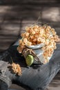 white currants in ceramic dishes on a wooden rustic table. Harvest of white currants, still life with wonderful sunlight Royalty Free Stock Photo