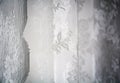 White curtain decorated with sewed floral pattern in lace