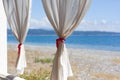 White curtains against the sea